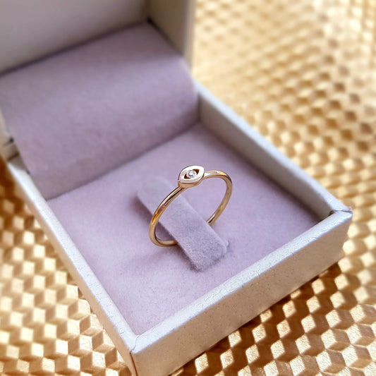 טבעת עין הרע זהב 14 קראט משובצת יהלום טבעי